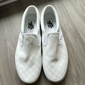 Vans Slip On Checkerboard Sneakers.